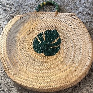 Woven Straw Bag with Green Leaf Design